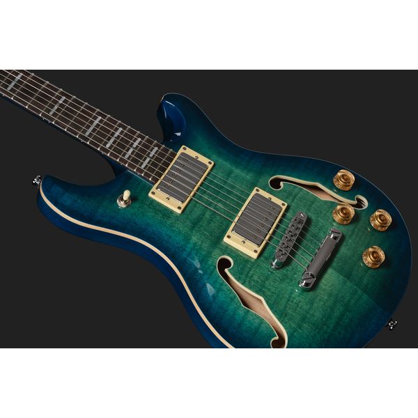Larry Carlton Q7 Hollow Transparent Blue
